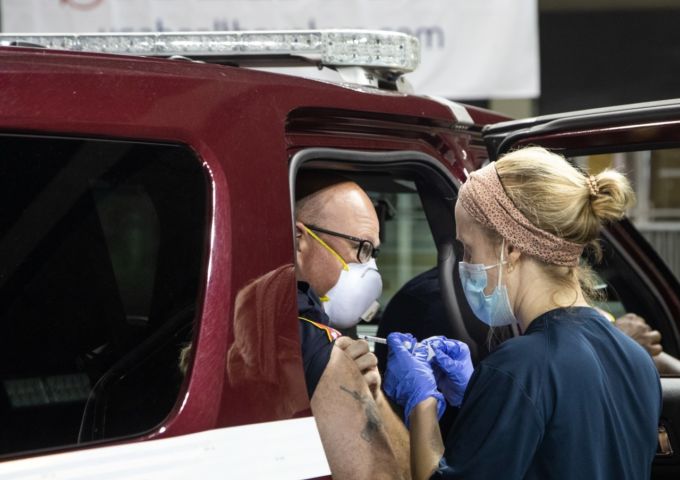 Covid vaccine firefighter